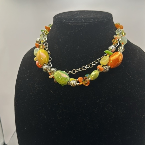 Absolutely beautiful spring necklace. The beads are glass and summer acrylic.​​ - Picture 2 of 6